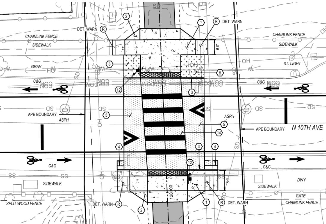 "Raised crossing with Rectangular Rapid Flashing Beacon at 10th Avenue"