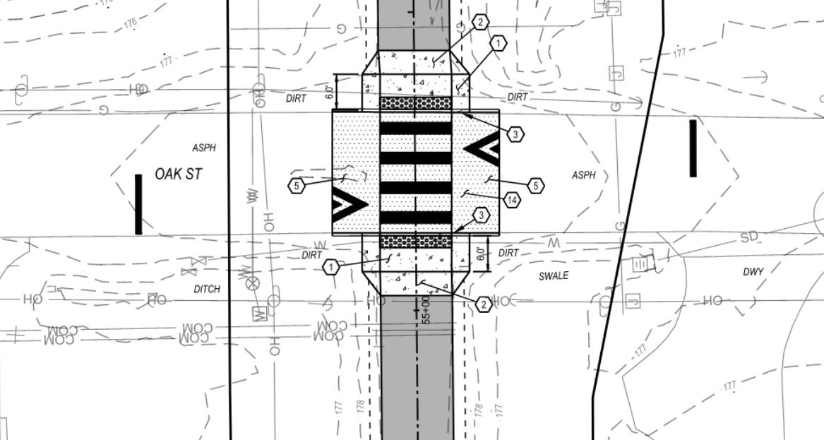 "Design exhibit showing a raised crosswalk at Oak Street"