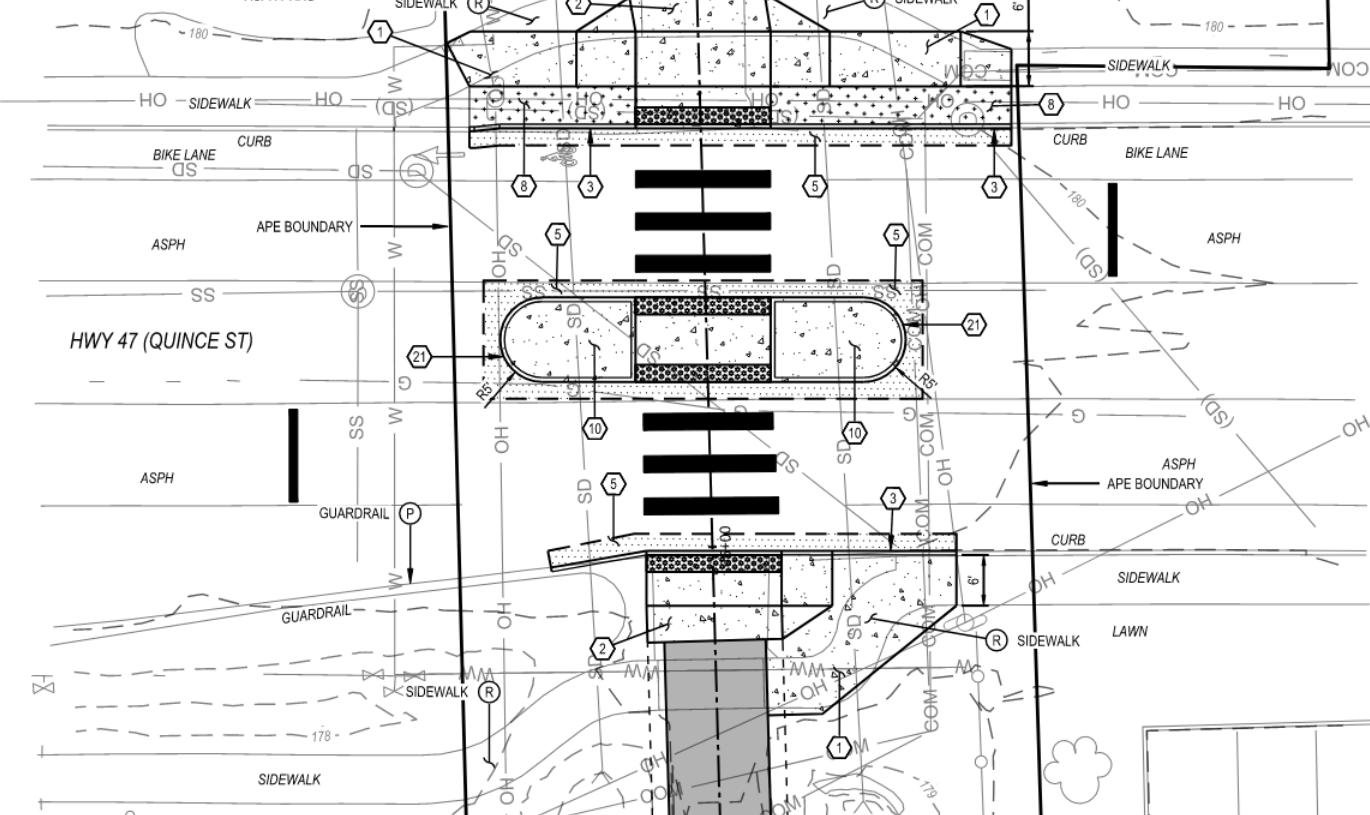"Raised crossing with median island at Quince Street (OR 47)"